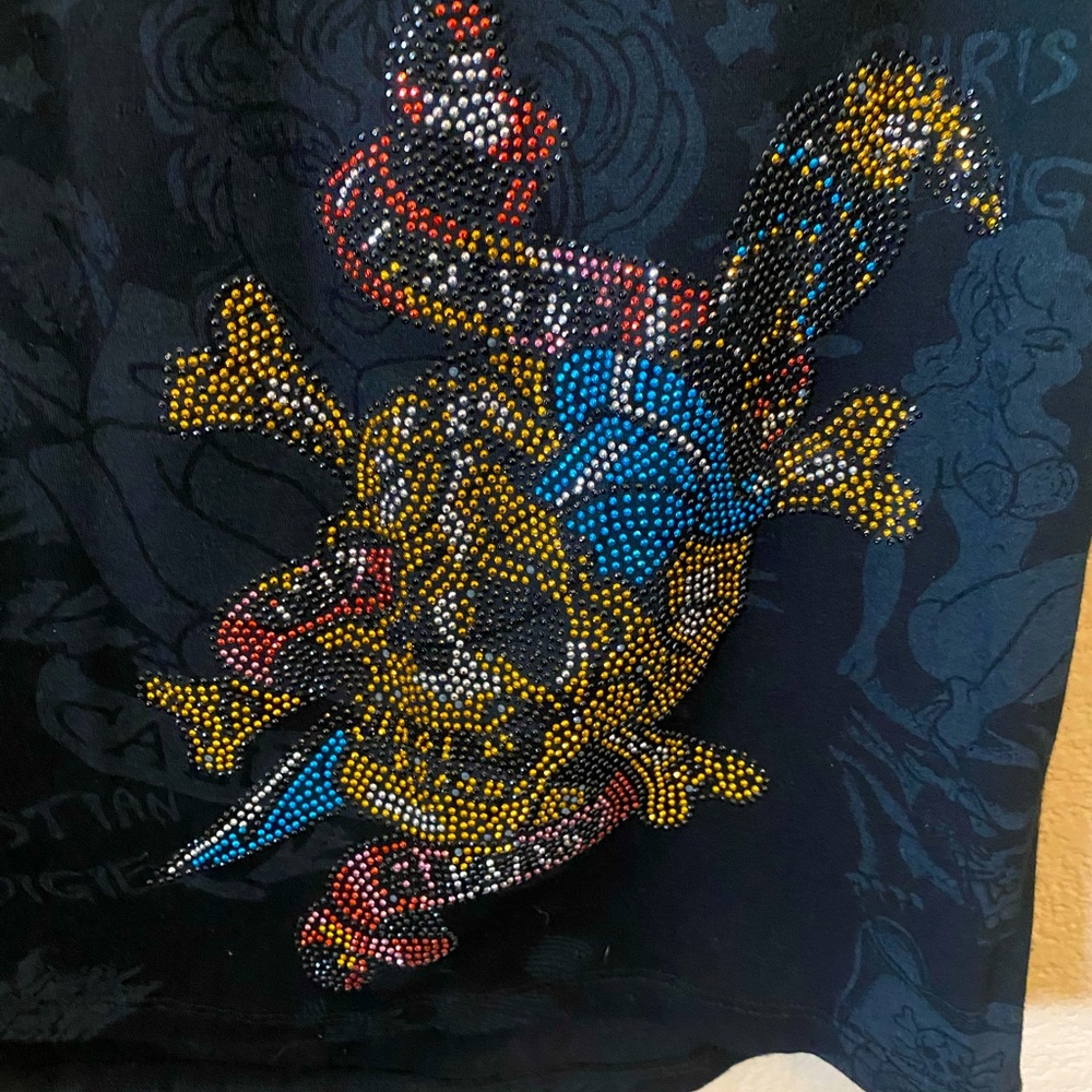 Ed Hardy cut out cold shoulder shirt.